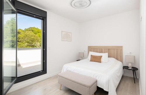 Llanes Apartamento | Ático en Llanes con gran terraza, piscina y pista de paddel