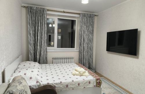 Almaty District Apartamento | Квартира рядом Новый вокзал Нурлы жол и мечеть Хазрет Султан, быстрый Wi-fi