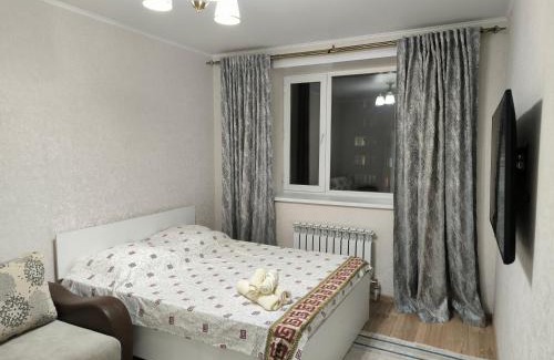 Almaty District Apartamento | Квартира рядом Новый вокзал Нурлы жол и мечеть Хазрет Султан, быстрый Wi-fi