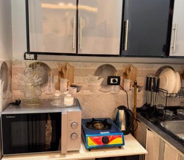 Al Duqqi Apartamento | استديو فندقي بالعجوزة