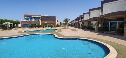 Al Kura Apartamento | شالية منتجع ارض السعادة 1