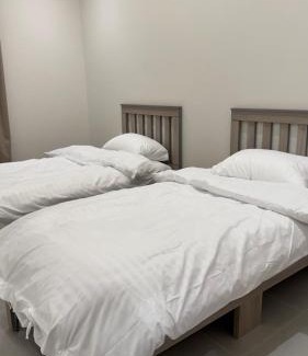Almajaridah Apartamento | غرفة نوم بسريرين مفرده