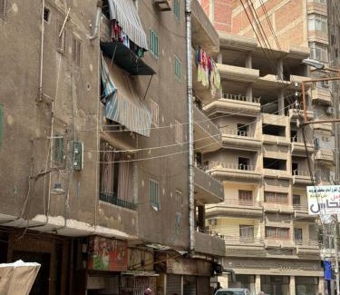 Mansoura Apartamento | غرفه خاصه لك جديده وفرش جديد ومميز بها سريرين وتلفزيون