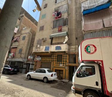 Mansoura Apartamento | غرفه خاصه لك جديده وفرش جديد ومميز بها سريرين وتلفزيون
