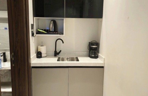 Buraydah Apartamento | فايان استديو مودرن بسرير مزدوج وصالة ودخول ذكي في المنطقة الحية في شمال بريدة