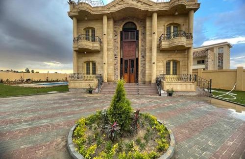 6th of October City Villa | فيلا للايجار اليومى فى الريف الاوربي- طريق مصر اسكندرية الصحراوى - قريبة من مطار سفنكس - وهايبر وان الصحراوى- 5 غرف نوم وحمام سباحة وكيدز ايريا وشواية