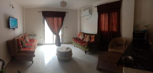 Shurtah al-Dakhlah Apartamento | قريه تافيرا بيتش راس سدر