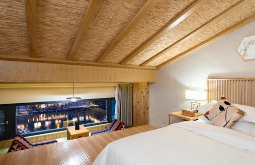 Fenghuang Apartamento | 云桥自在江景民宿