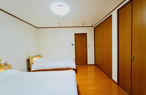 Higashikujo Kitakarasumacho Apartamento | 京都佳月民宿