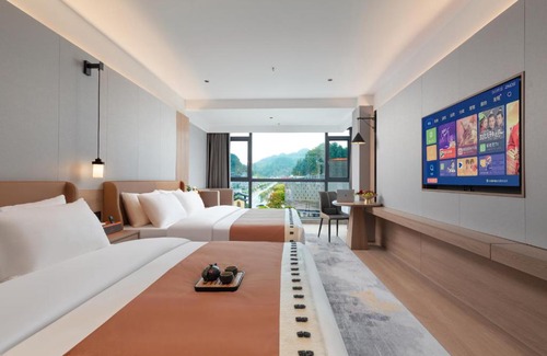 Fenghuang Hotel | 凤凰讴印森林温泉国际酒店