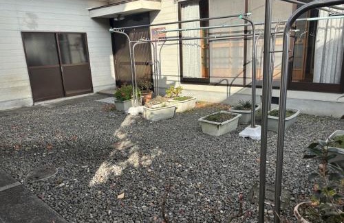 Hoshinooka Casa | 木の家ゲストハウス松山本館