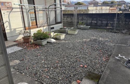 Hoshinooka Casa | 木の家ゲストハウス松山本館