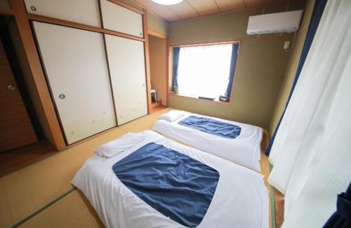 Furusato Cho Apartamento | 桜島の廃校を使った和室ゲストハウスulalaふるさと