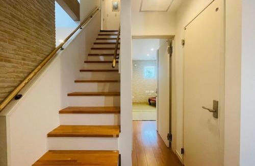 Okinawa Chalet De Esquí | 空港まで車で15分ビーチまで徒歩1分海沿いの閒雲斎