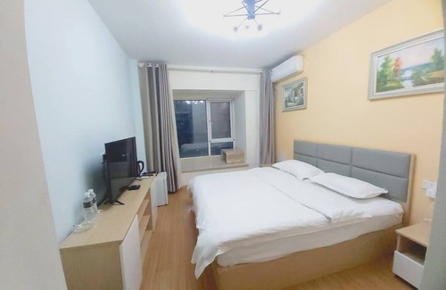 Chengyang Apartamento | 青春球场,世纪公园,青岛国家广告产业园丰富美食