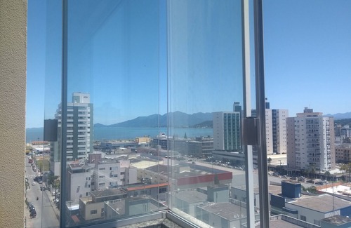 Campinas Apartamento | 1/4 bedroom apartment with garage and sea view