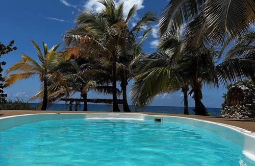 West End Casa | ¡HERMOSA!, palmeras, playa de arena, piscina con velas de sombra, cabaña de playa, ¡y MÁS!