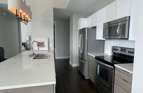 Garden Hills Condominio | 1 Bed, 1 Bath Luxury High Rise Condo. Sleeps 4