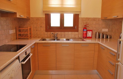 Aphrodite Hills Apartamento | Apartamento de lujo de 1 cama junto a la piscina en el galardonado Aphrodite Hills Resort Kouklia