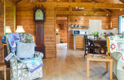 Llangeler Cabaña | This hand crafted lodge was picked for its beautiful setting with gorgeous countryside views.