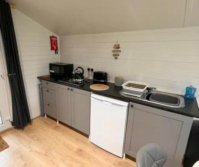 Corwen Casa | 1 Bedroom Log Cabin in Parc Pen y Bryn Sleep 2 3