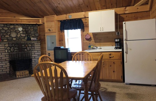 The Forks Cabina | 1 Bedroom Riverside Cabin in The Forks, ME, pet friendly