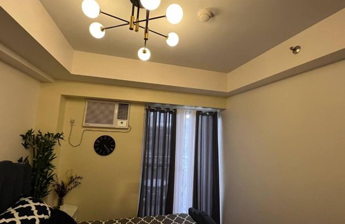 A. Bonifacio Apartamento | 1-BR Condo Unit at The Celandine with Refreshing Balcony-view of the Pool
