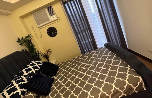 A. Bonifacio Apartamento | 1-BR Condo Unit at The Celandine with Refreshing Balcony-view of the Pool