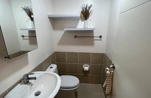 A. Bonifacio Apartamento | 1-BR Condo Unit at The Celandine with Refreshing Balcony-view of the Pool