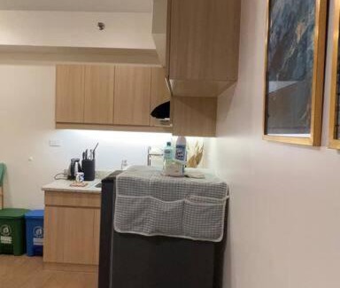 A. Bonifacio Apartamento | 1-BR Condo Unit at The Celandine with Refreshing Balcony-view of the Pool