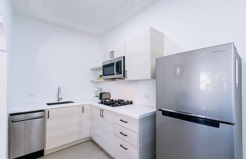 Malmok Apartamento | 1 MIN Walk 2 Arashi Beach Suite w Roofdeck Pool