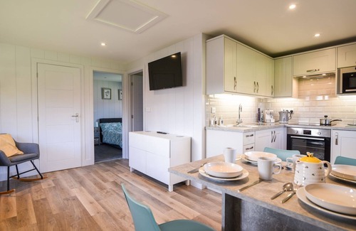 Combpyne Cabaña | 1 PINEWOOD RETREAT, family friendly, with pool in Lyme Regis