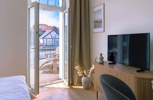 Warnemuende Apartamento | 1-Raum Appartment „Nr. 4“ mit großer Terrasse
