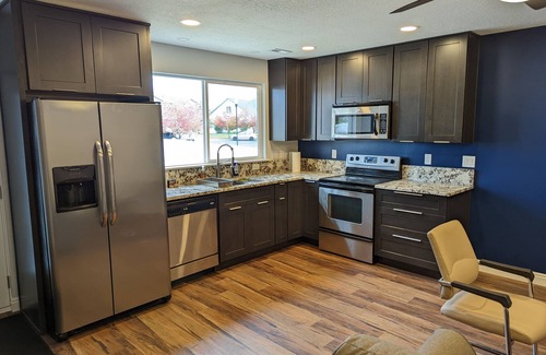 North Salt Lake Casa | 10 minutes to the airport and mountains - modern 2-bedroom walkout with fire pit