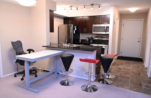 Northeast Edmonton Condominio | 10 minutes to the LRT station and Rec Centre! Family-sized condo with patio.