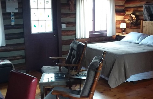 Eureka Springs Cabina | Cabaña de madera de 100 años de edad, pase su fin de semana especial con nosotros