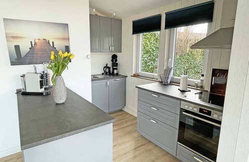 Ruckeberg Casa | 100m away from the beautiful Schlei, you will find our extensively renovated and modern bungalow "Schlei-Idyll" with maritime details, as well as a small garden area with terrace for your well-deserved time out