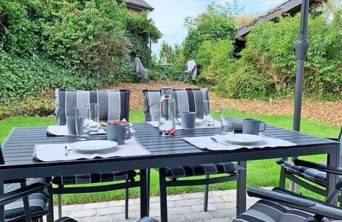 Ruckeberg Casa | 100m away from the beautiful Schlei, you will find our extensively renovated and modern bungalow "Schlei-Idyll" with maritime details, as well as a small garden area with terrace for your well-deserved time out