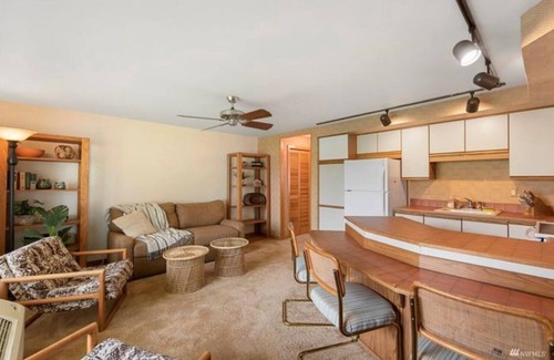 Quincy Condominio | #119 Crescent Bar Tropical Paradise with access to large pool and hot tub