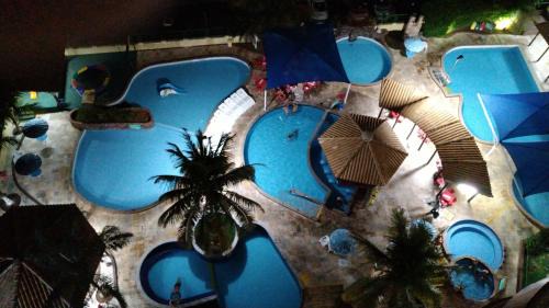 J Jeriquara Apartamento | 1403 AP 2 Quartos , banheira de hidro privativa, bebidas liberadas nas piscinas , internet no ap, proximo ao shopping singapura