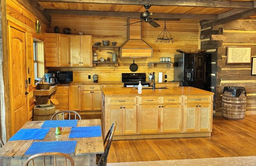 Arkadelphia Casa | 1850 log cabin with 2 br, 2 baths, W/D, mini split A/C, carport attached