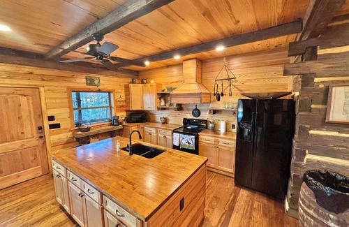 Arkadelphia Casa | 1850 log cabin with 2 br, 2 baths, W/D, mini split A/C, carport attached