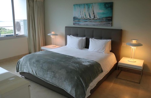 Playa Bonita Village Apartamento | 18G Luxury Oceanview with Roof Top Pool