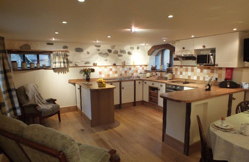 Penycae Cabaña | 18th Century sandstone cottage with all modern comforts and old world charm.