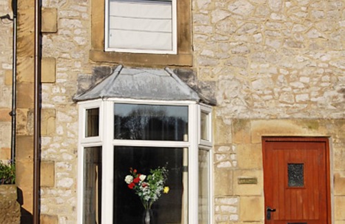Tideswell Cabaña | 18th Century Stone Cottage, familia y mascotas en Tideswell