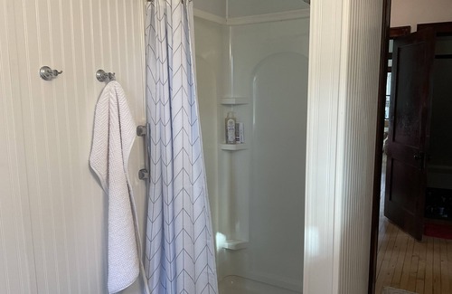 Pentwater Otro | 1920s Renovated Spacious Craftsman Farmhouse, located near Lake Michigan.