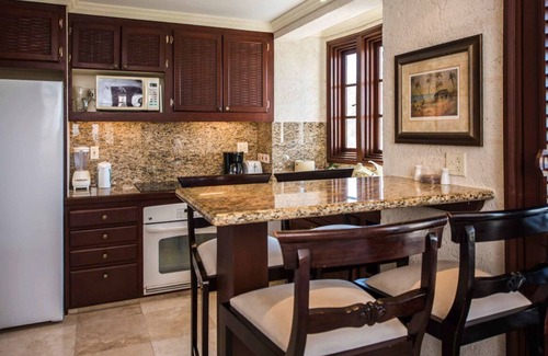 Diamond Valley Complejo | 1BR/2BA Suite - Kitchen, Living Room & Balcony - Private Resort on Crane Beach!
