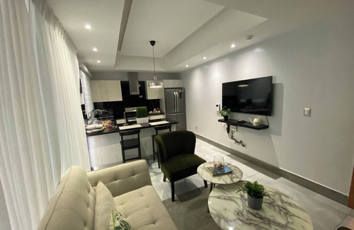 Ensanche Quisqueya Condominio | 1Br- LUX Location, Pool, Sauna, GYM -no need car for accommodation-