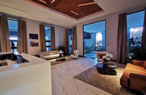 Santo Domingo Casa | 1br Luxury Condo Jacuzzi, gym Mountains with parking lot