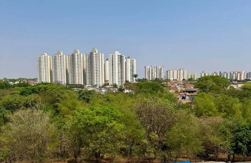 Goiania Apartamento | 2/4 apartment facing Bernardo Elis Park with beautiful sunset